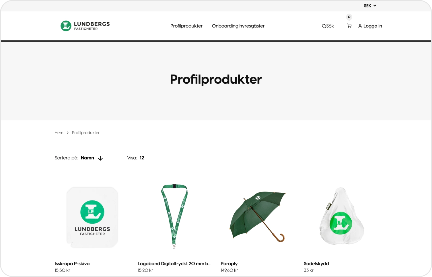 Produktlistan i Lundbergs Fastigheters webbshop, med deras logotyp och gr&ouml;na profilf&auml;rg p&aring; paraply, logoband och sadelskydd.